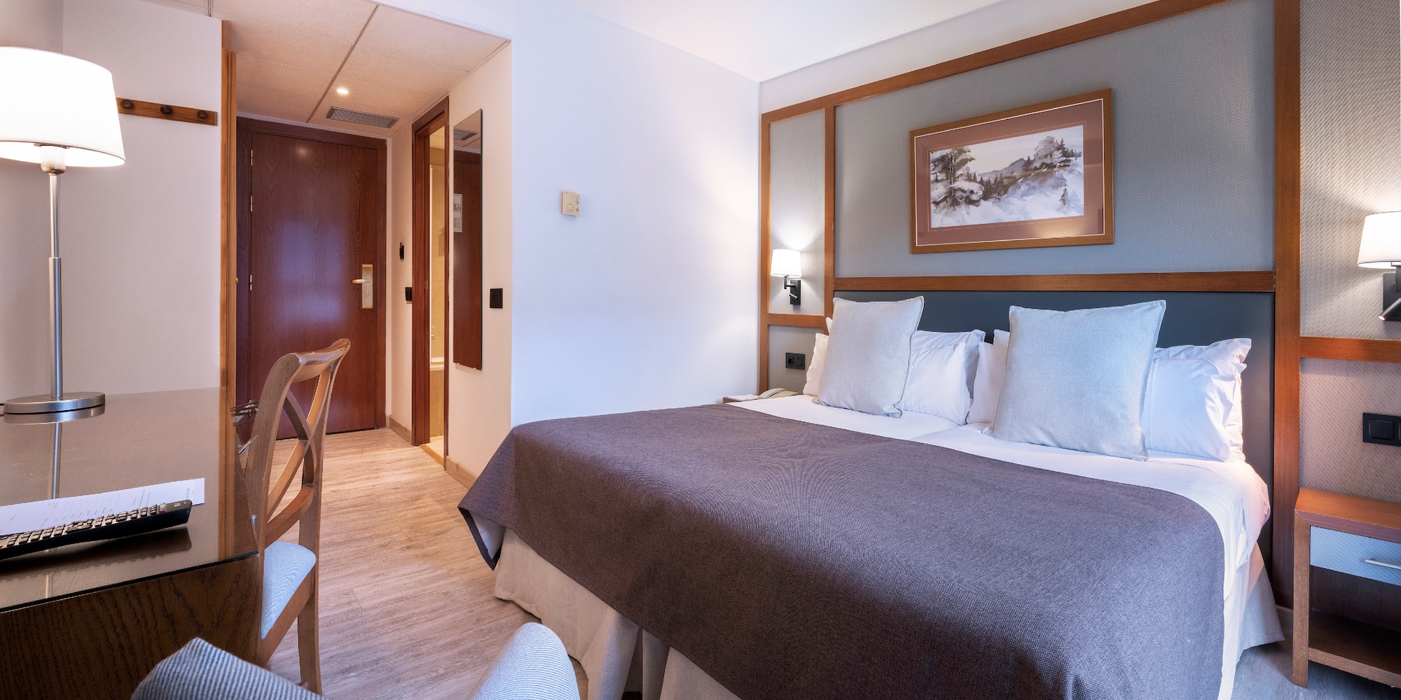 a room with a bed and a table