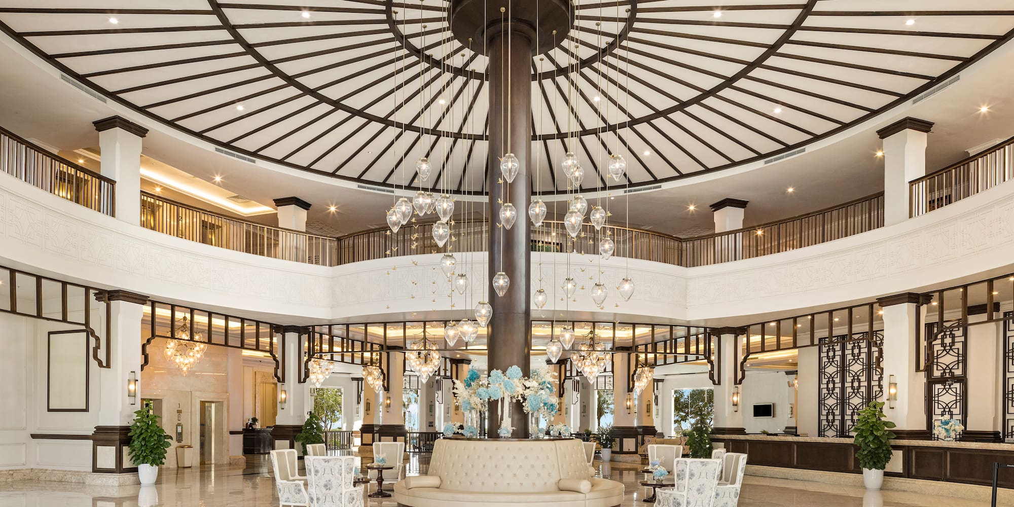 a large room with a large chandelier and a large ceiling