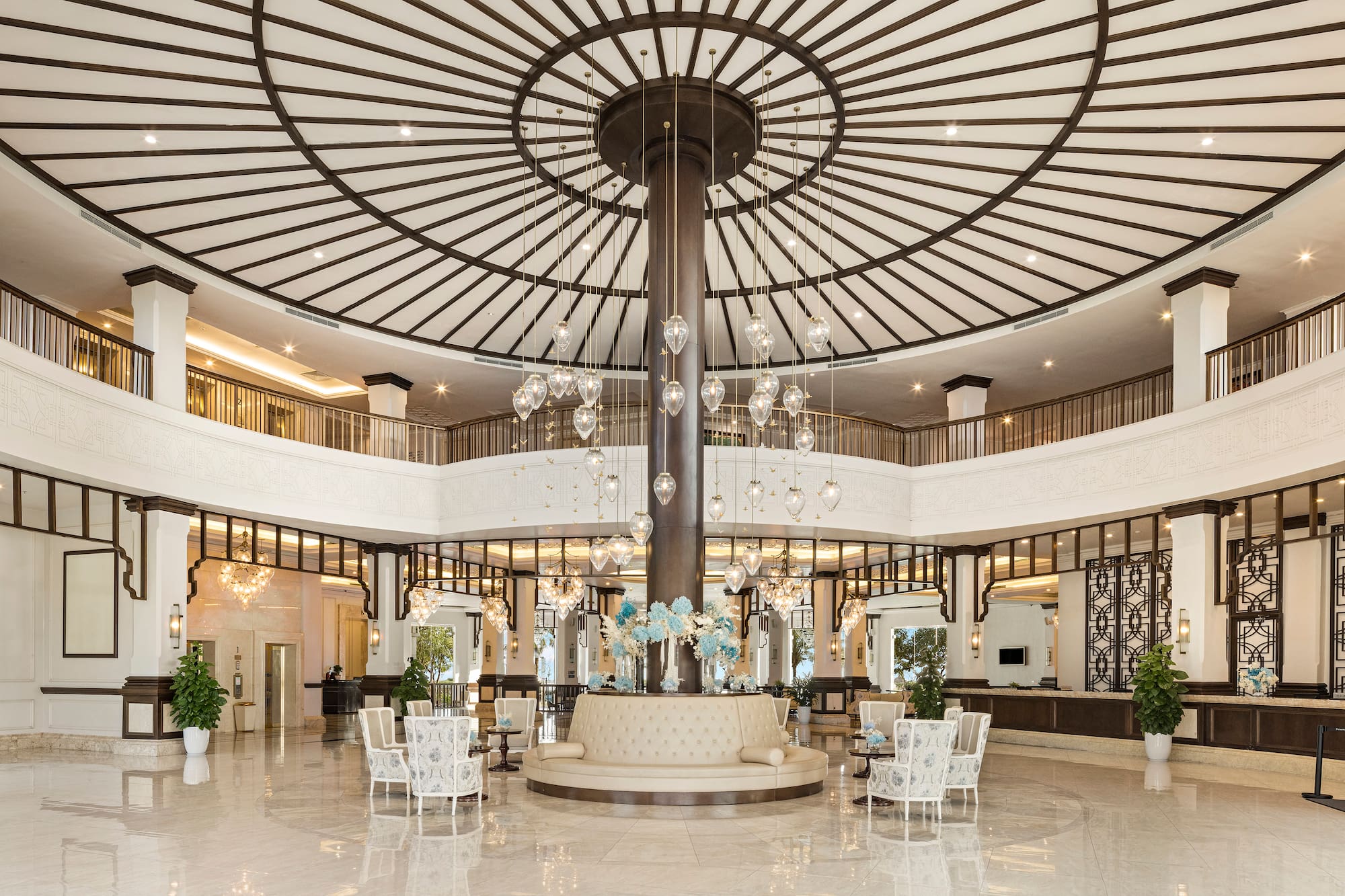 a large room with a large chandelier and a large ceiling