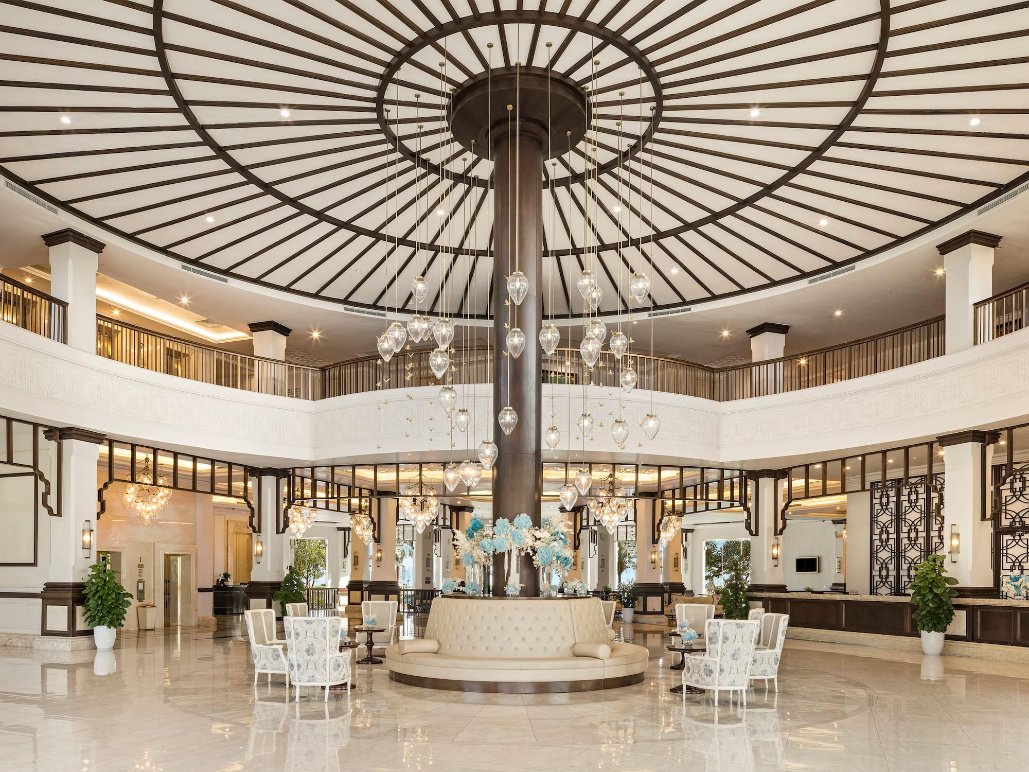 a large room with a large chandelier and a large ceiling