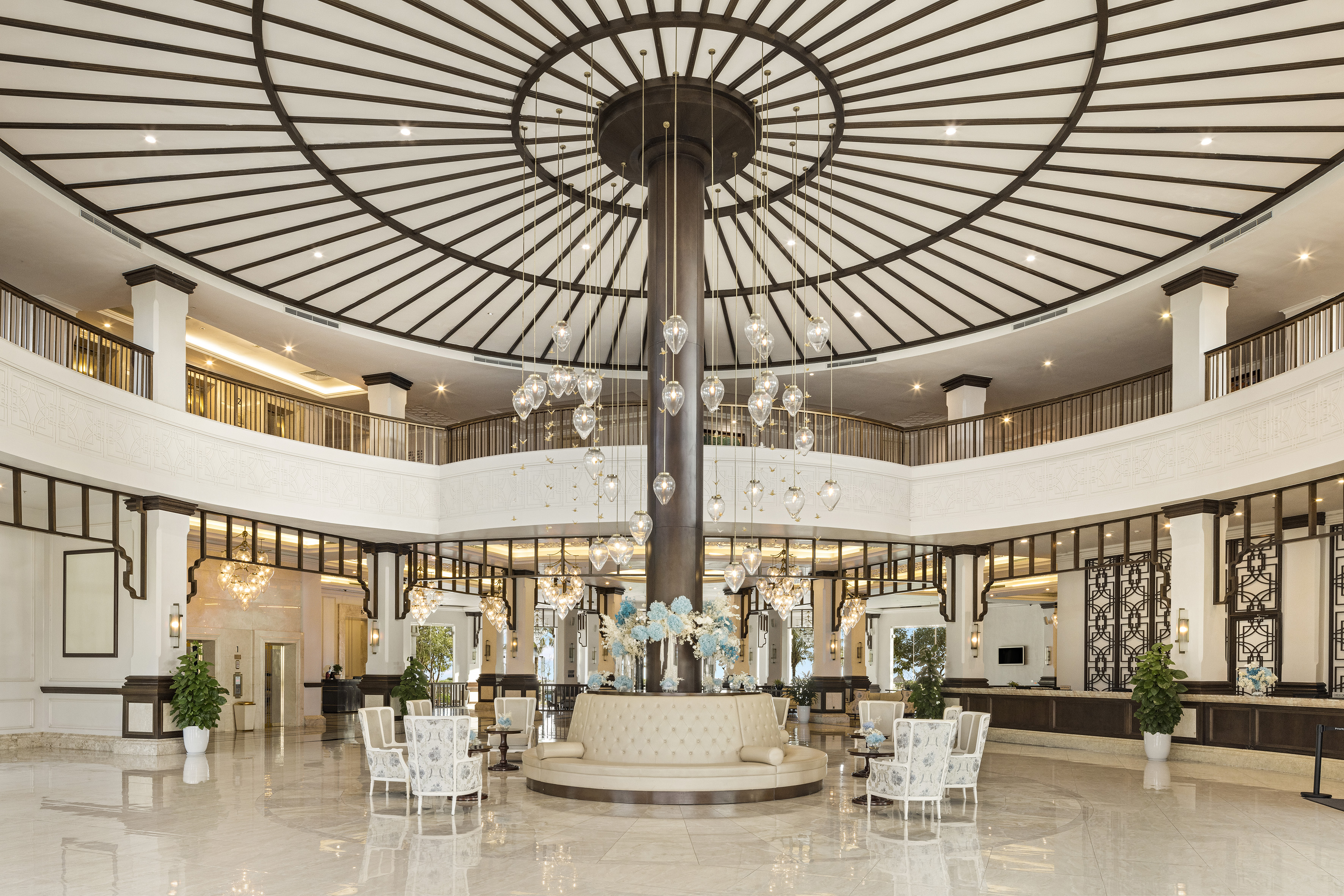 a large room with a large chandelier and a large ceiling