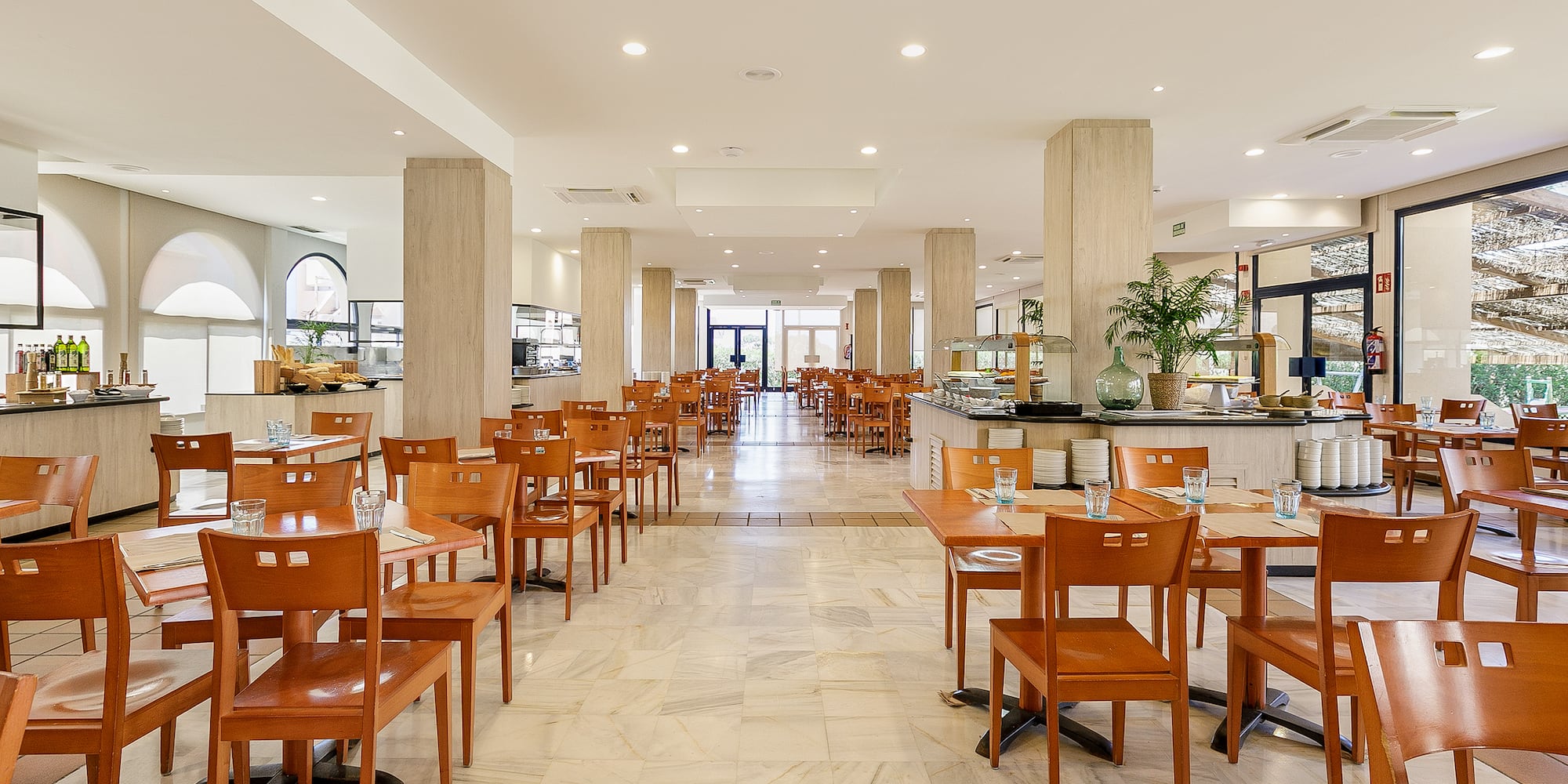 a room with tables and chairs
