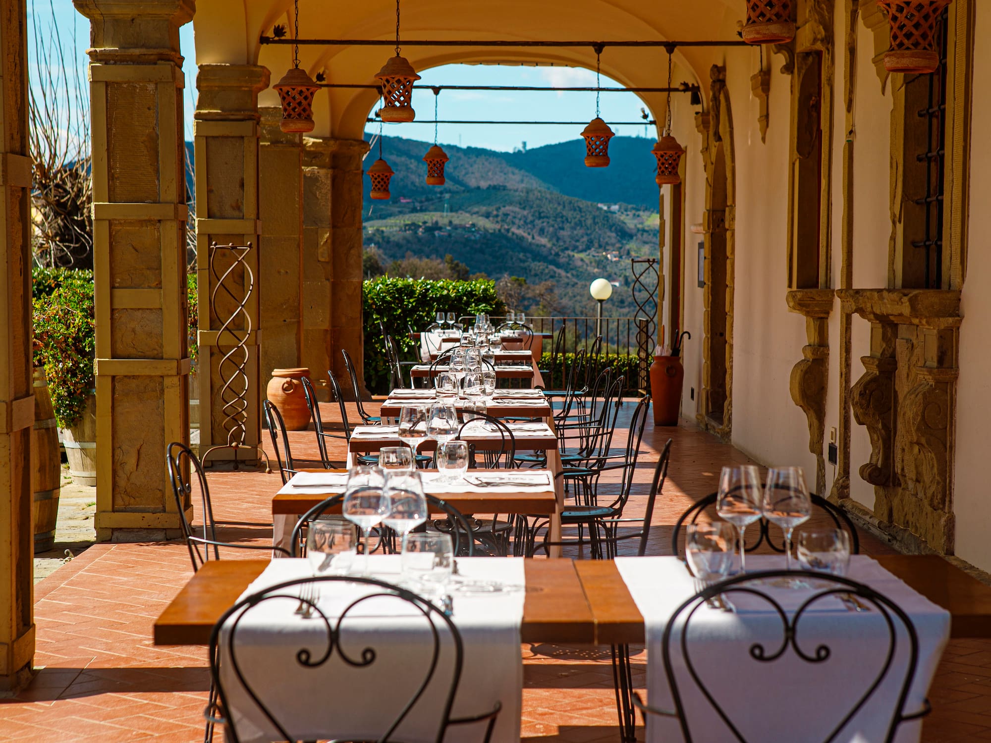 a restaurant with tables and chairs