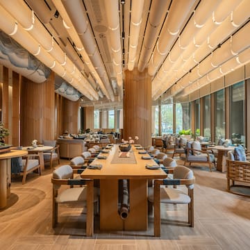 a large room with tables and chairs