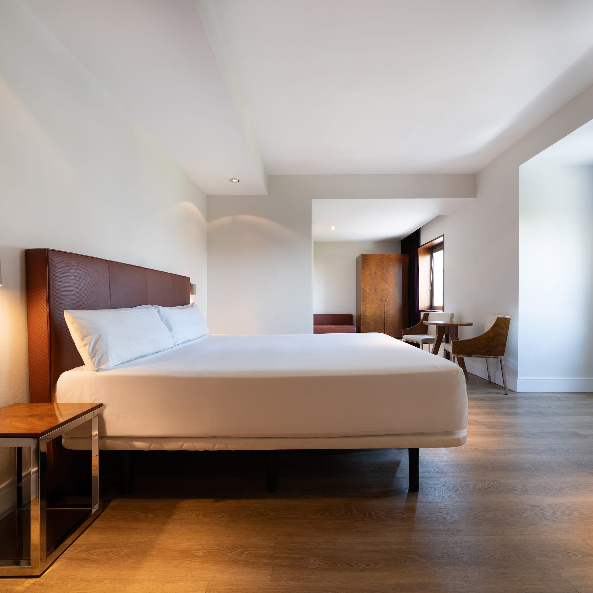 a room with a bed and a table