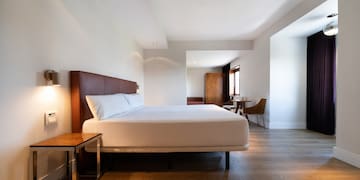 a room with a bed and a table