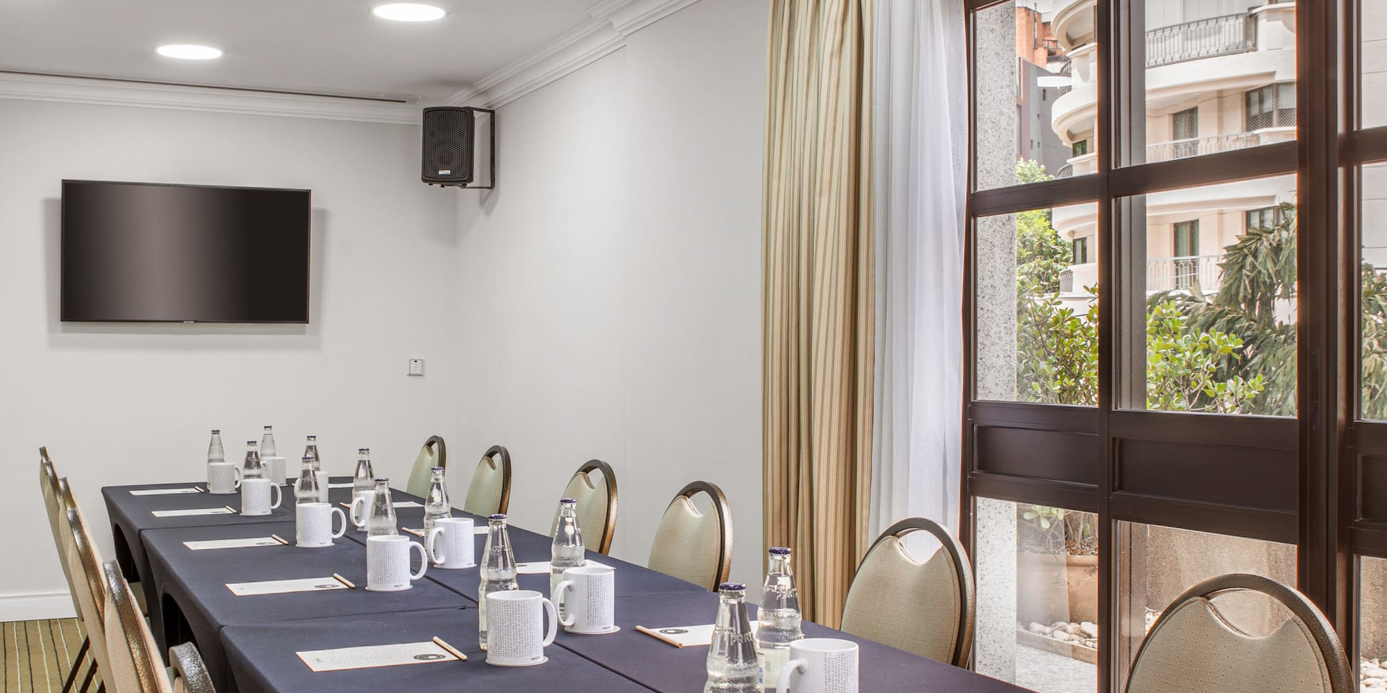 a room with a table and chairs