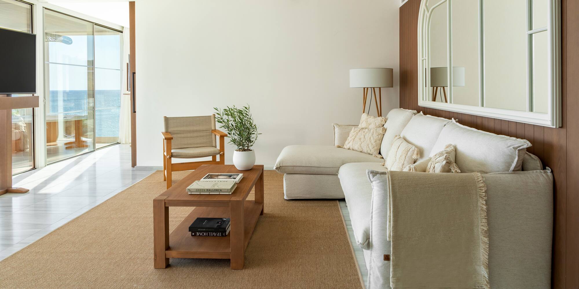 a living room with a couch and a table