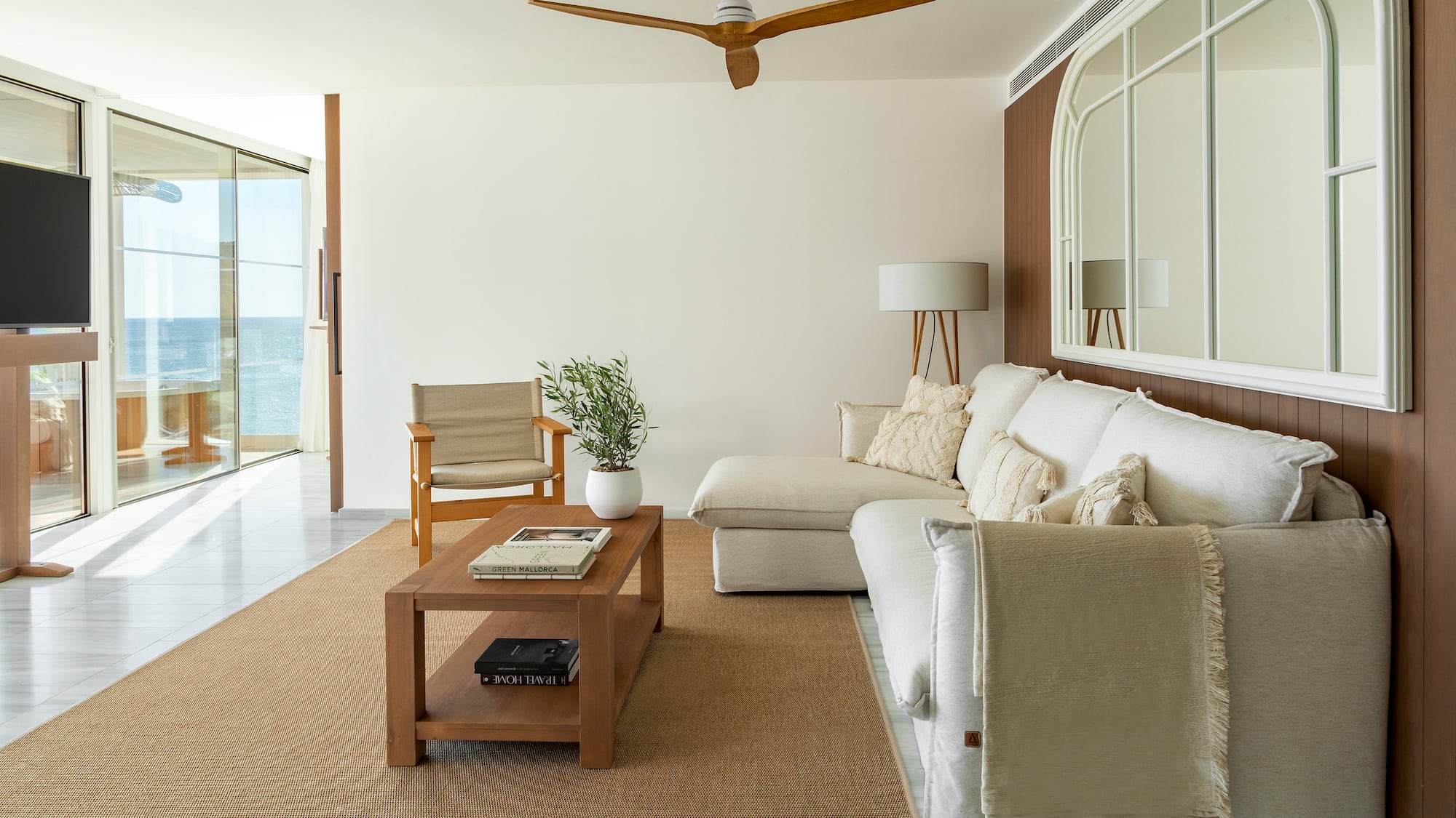 a living room with a couch and a table