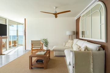 a living room with a couch and a table