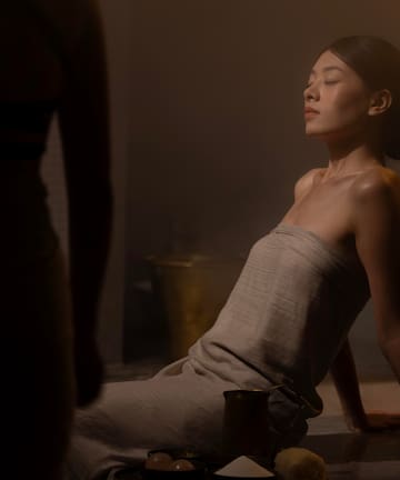 a woman sitting on the floor