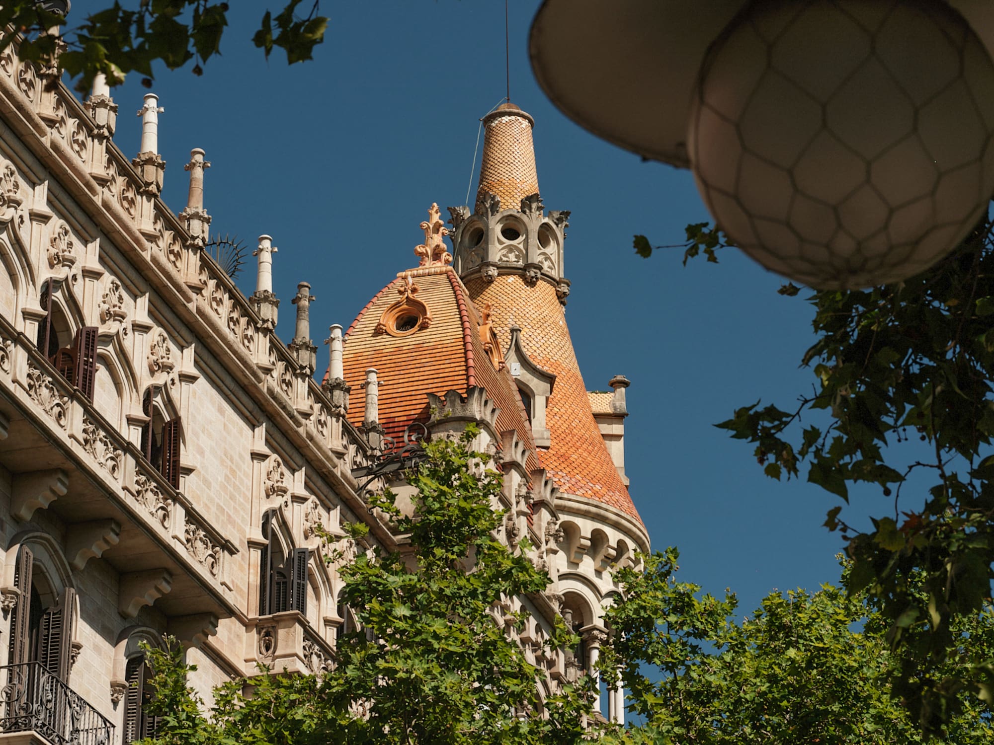 a building with a dome roof and trees