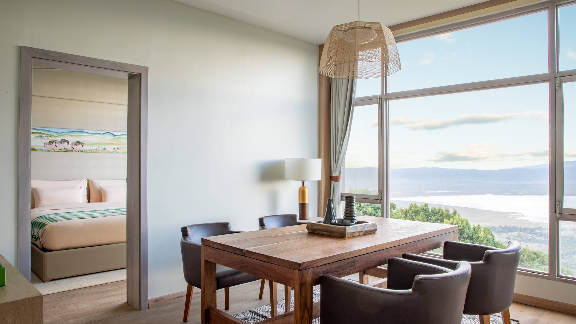 a room with a table and chairs