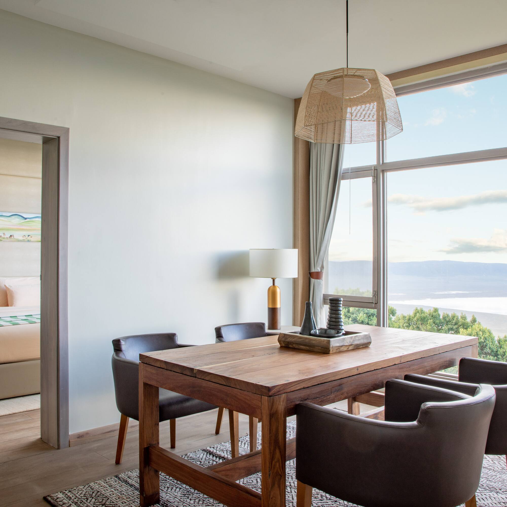 a room with a table and chairs