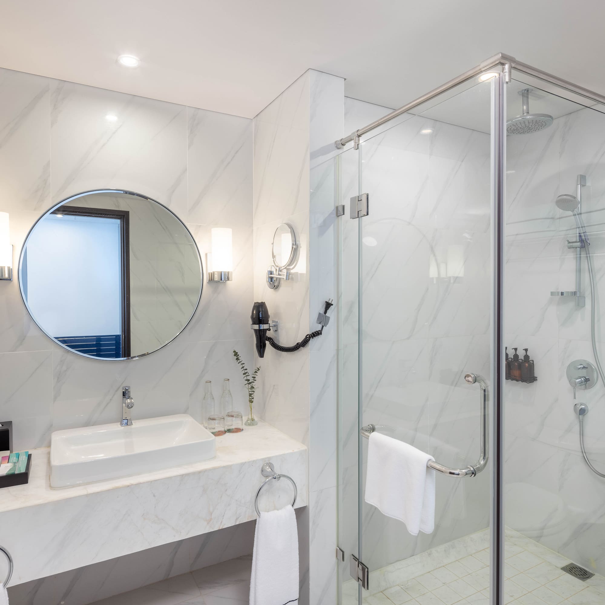 a bathroom with a mirror and sink
