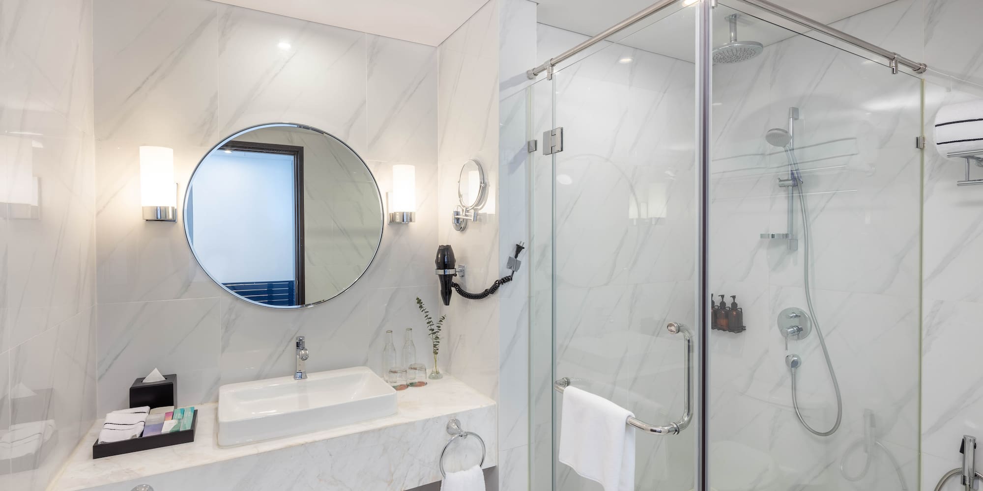 a bathroom with a mirror and sink