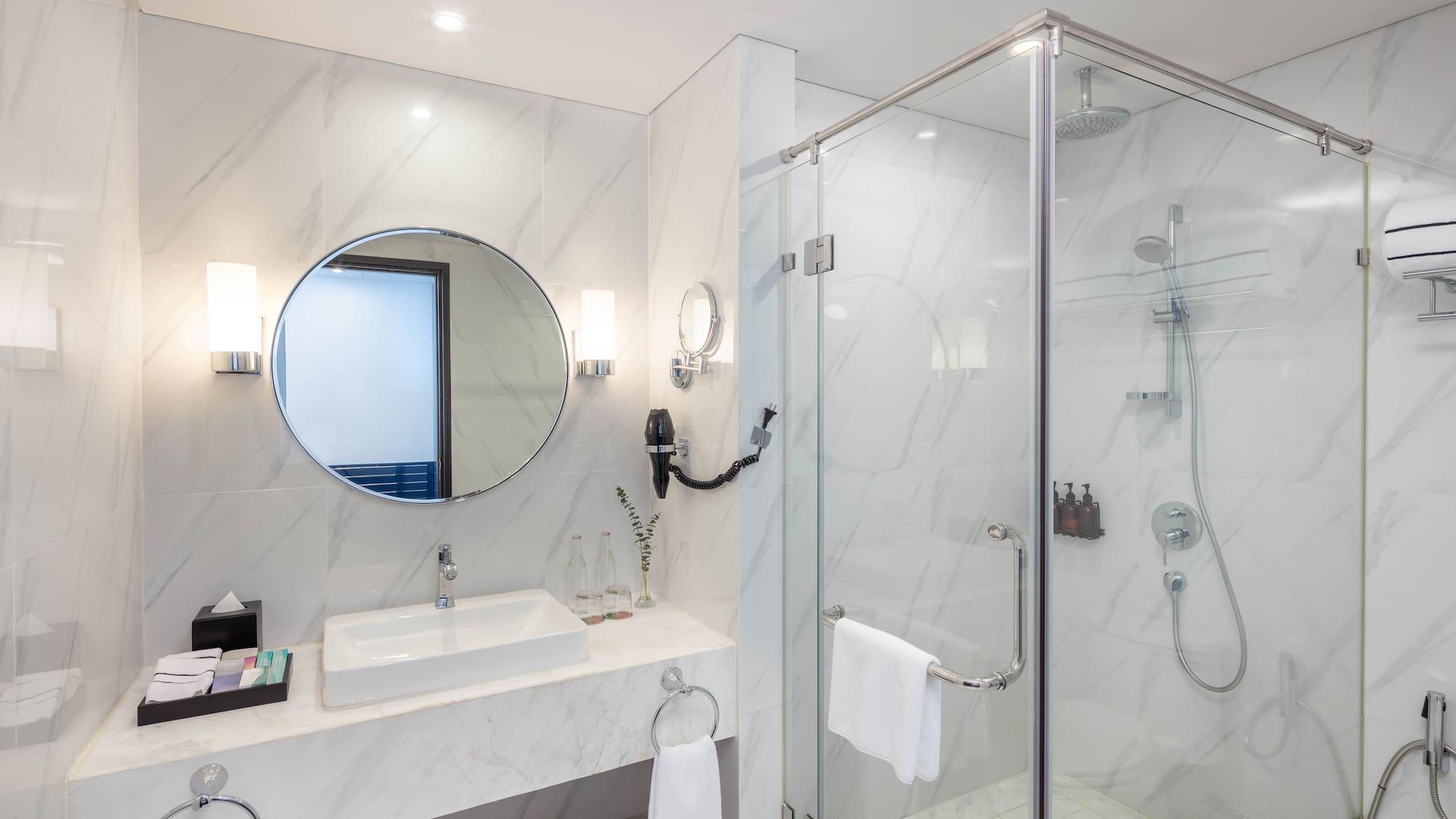 a bathroom with a mirror and sink