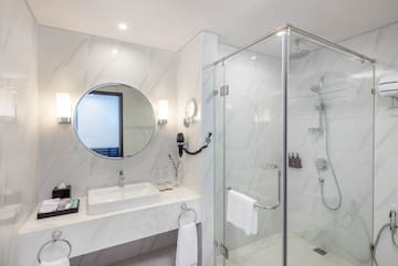 a bathroom with a mirror and sink