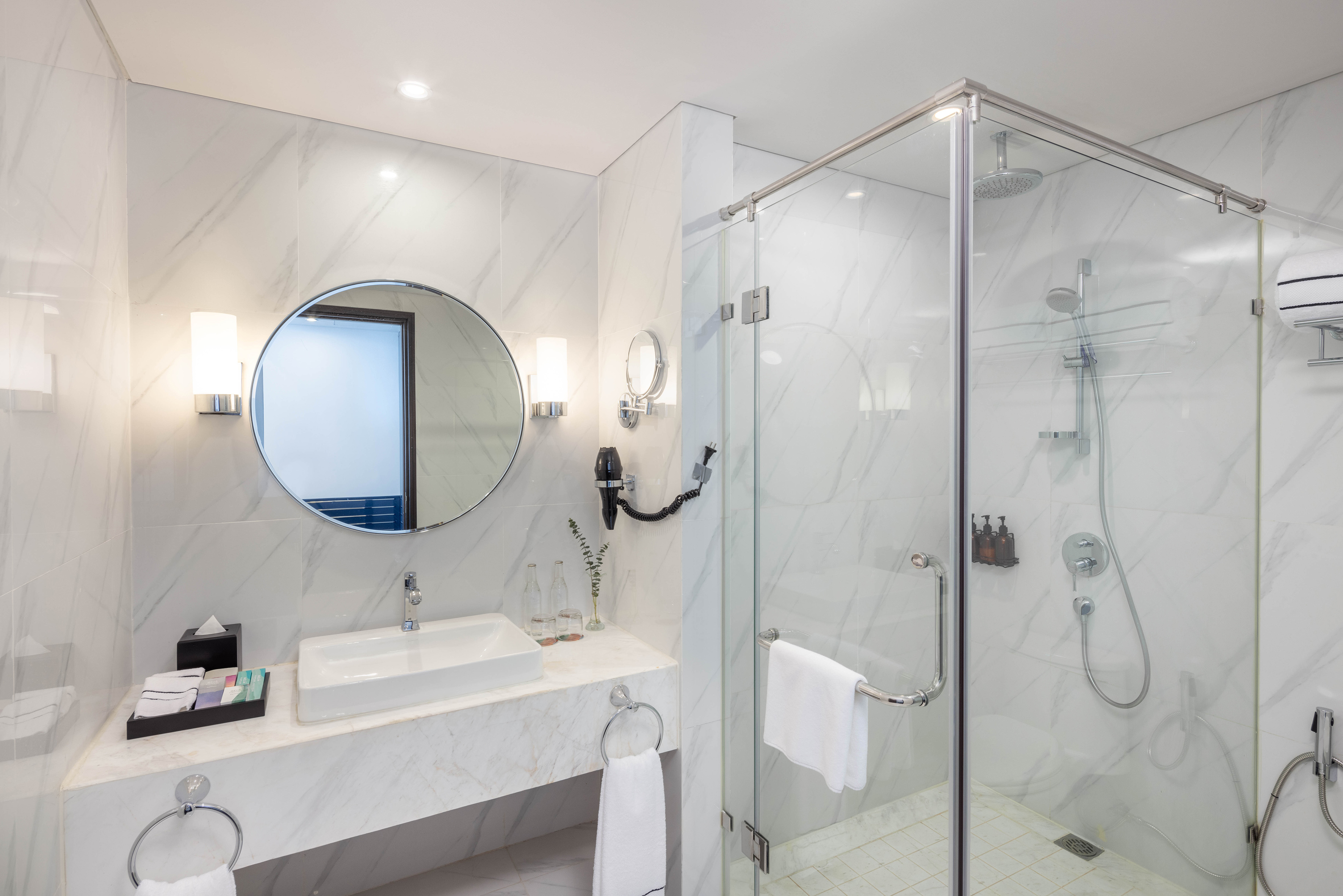 a bathroom with a mirror and sink