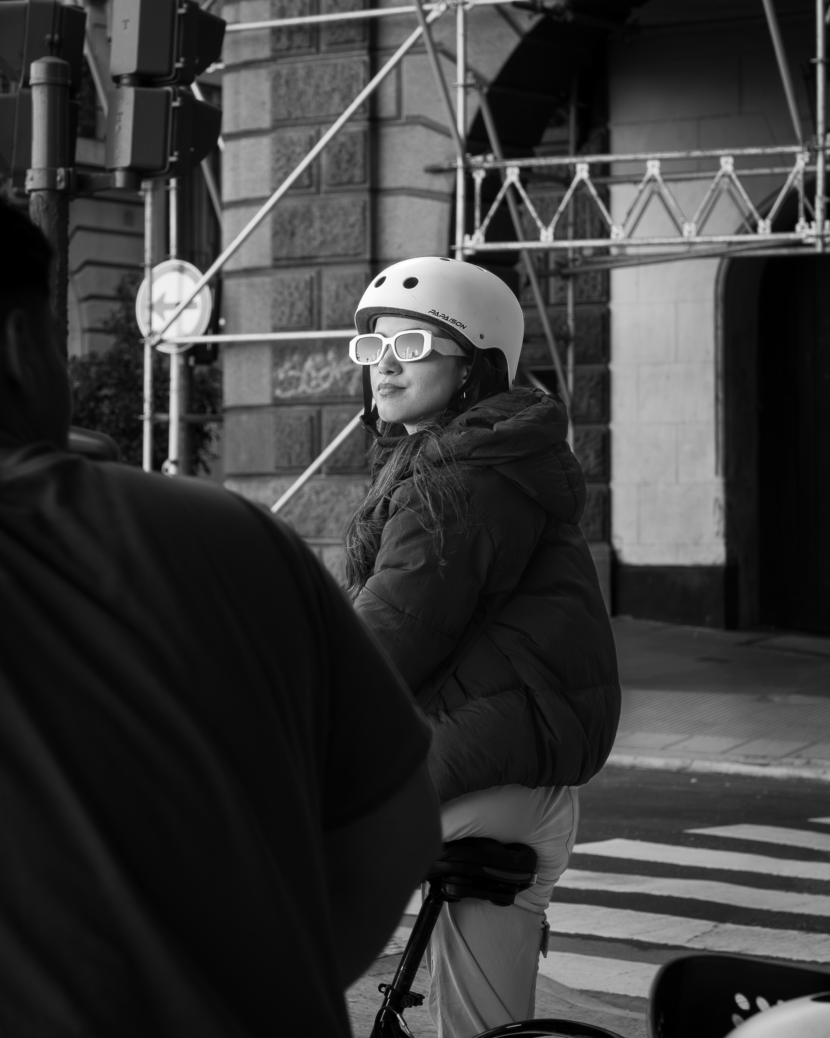 a person wearing a helmet and sunglasses