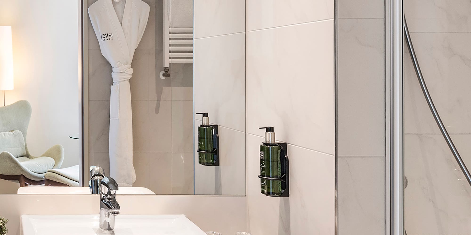 a bathroom with a sink and shower