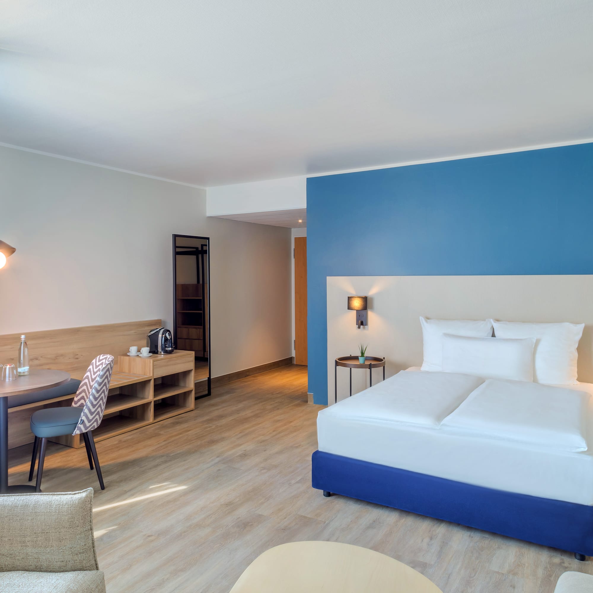 a room with a bed and a table