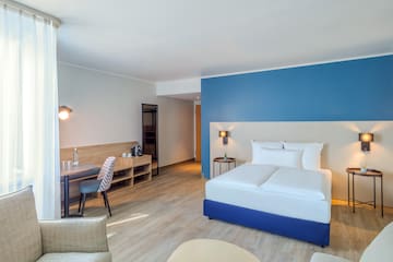 a room with a bed and a table
