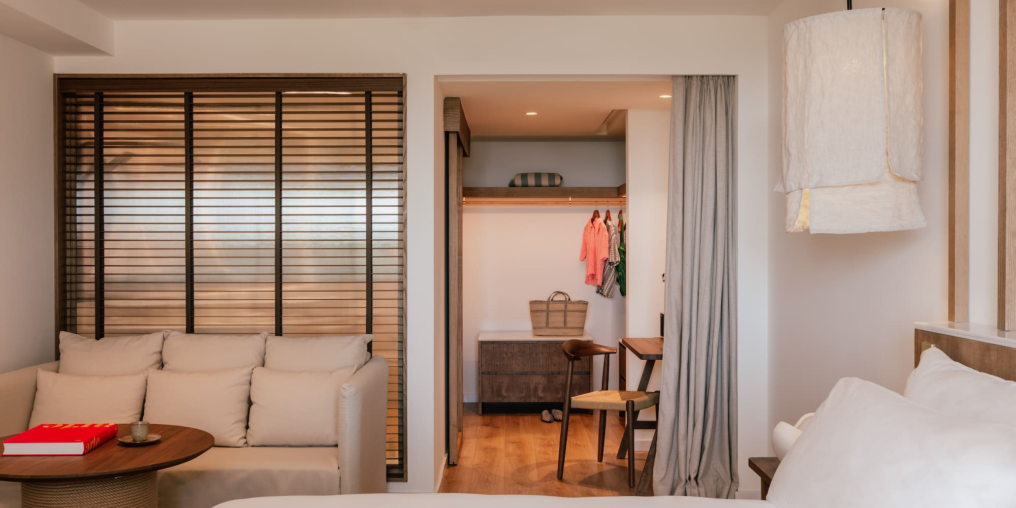 a room with a bed and a closet