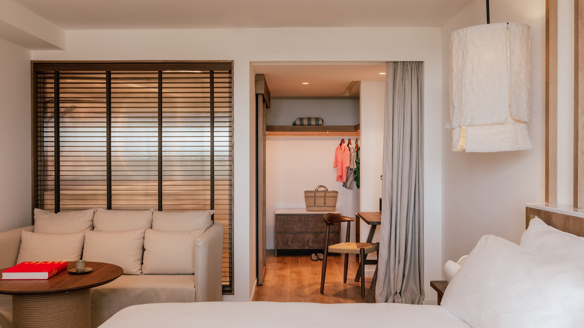 a room with a bed and a closet