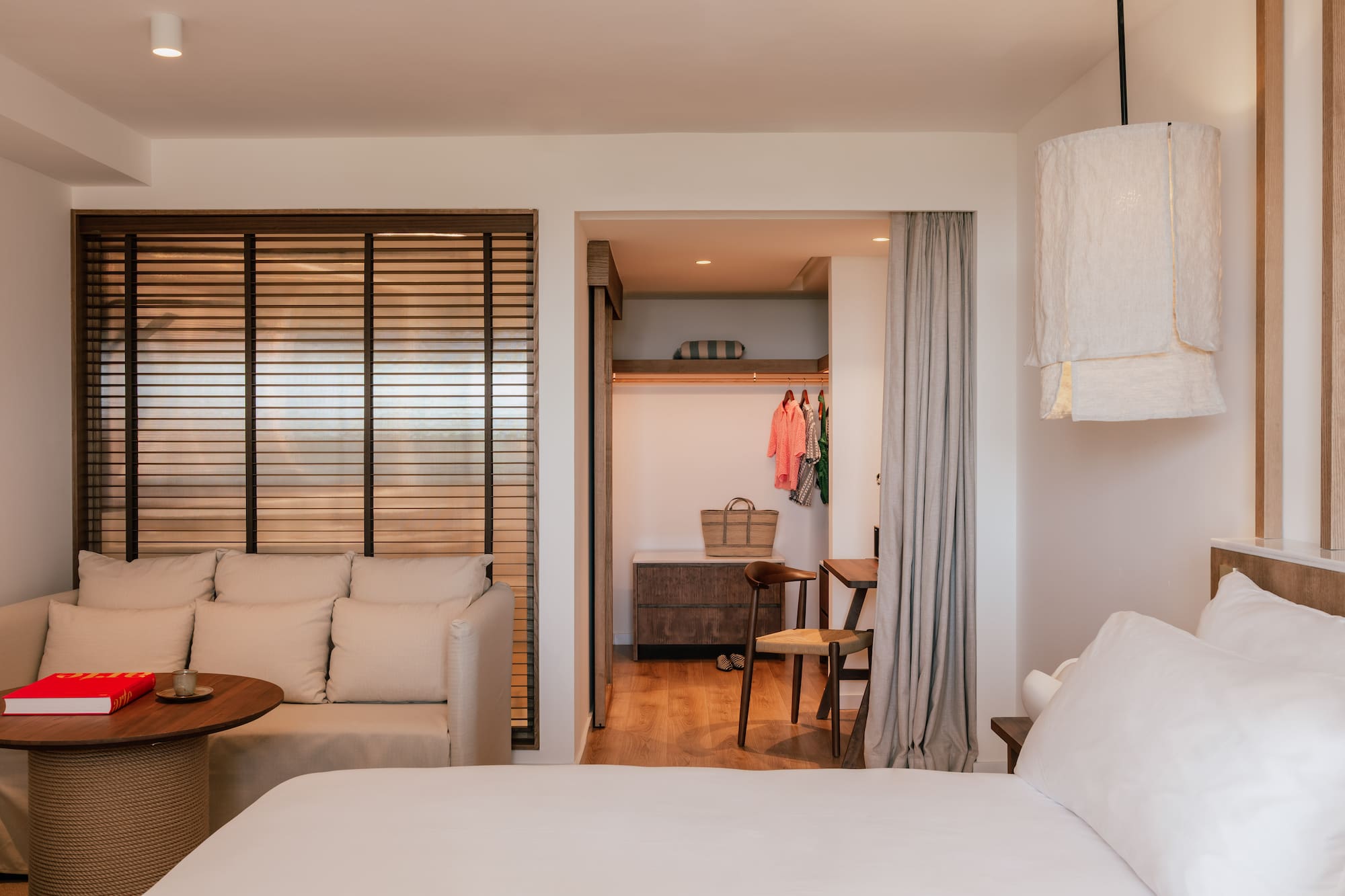 a room with a bed and a closet