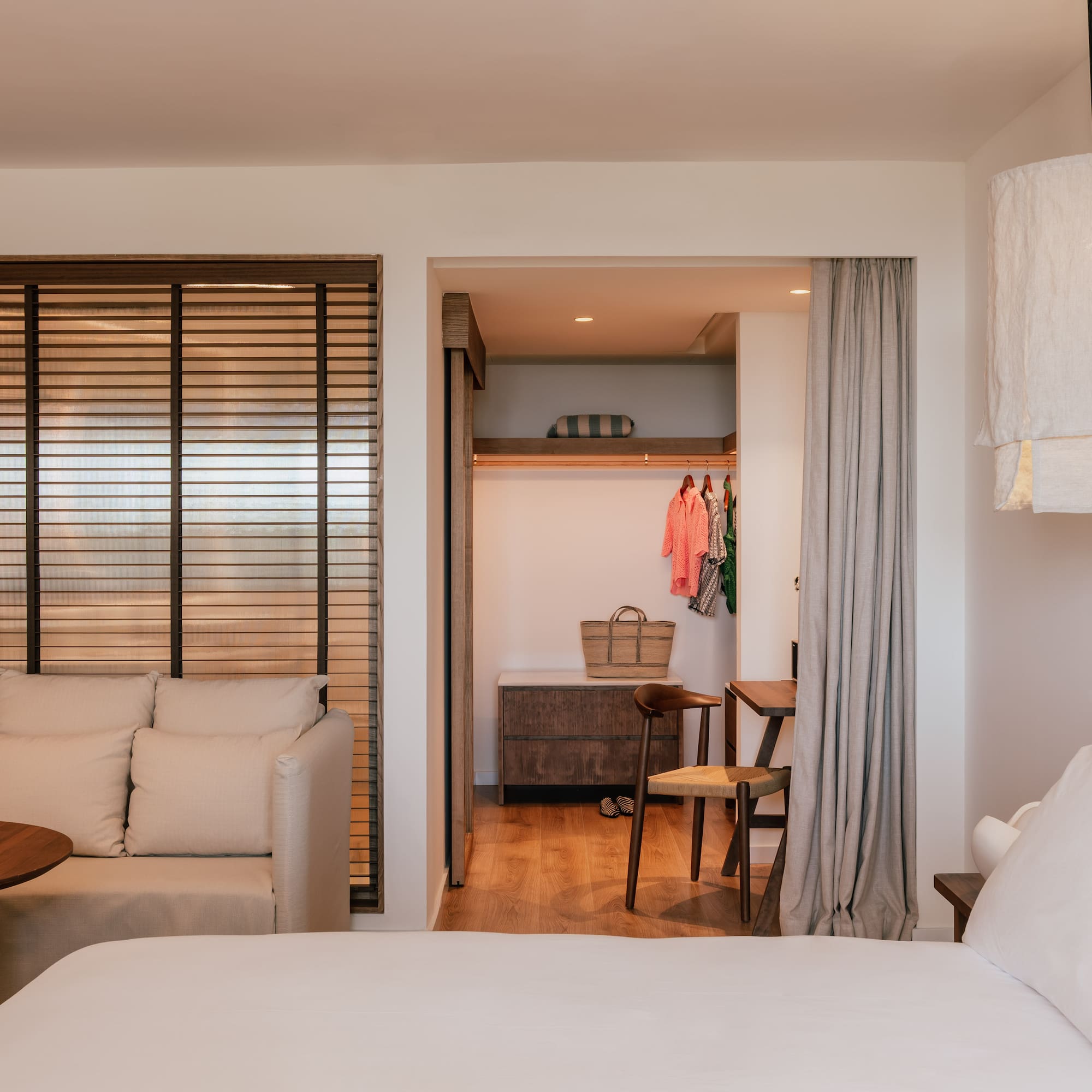 a room with a bed and a closet