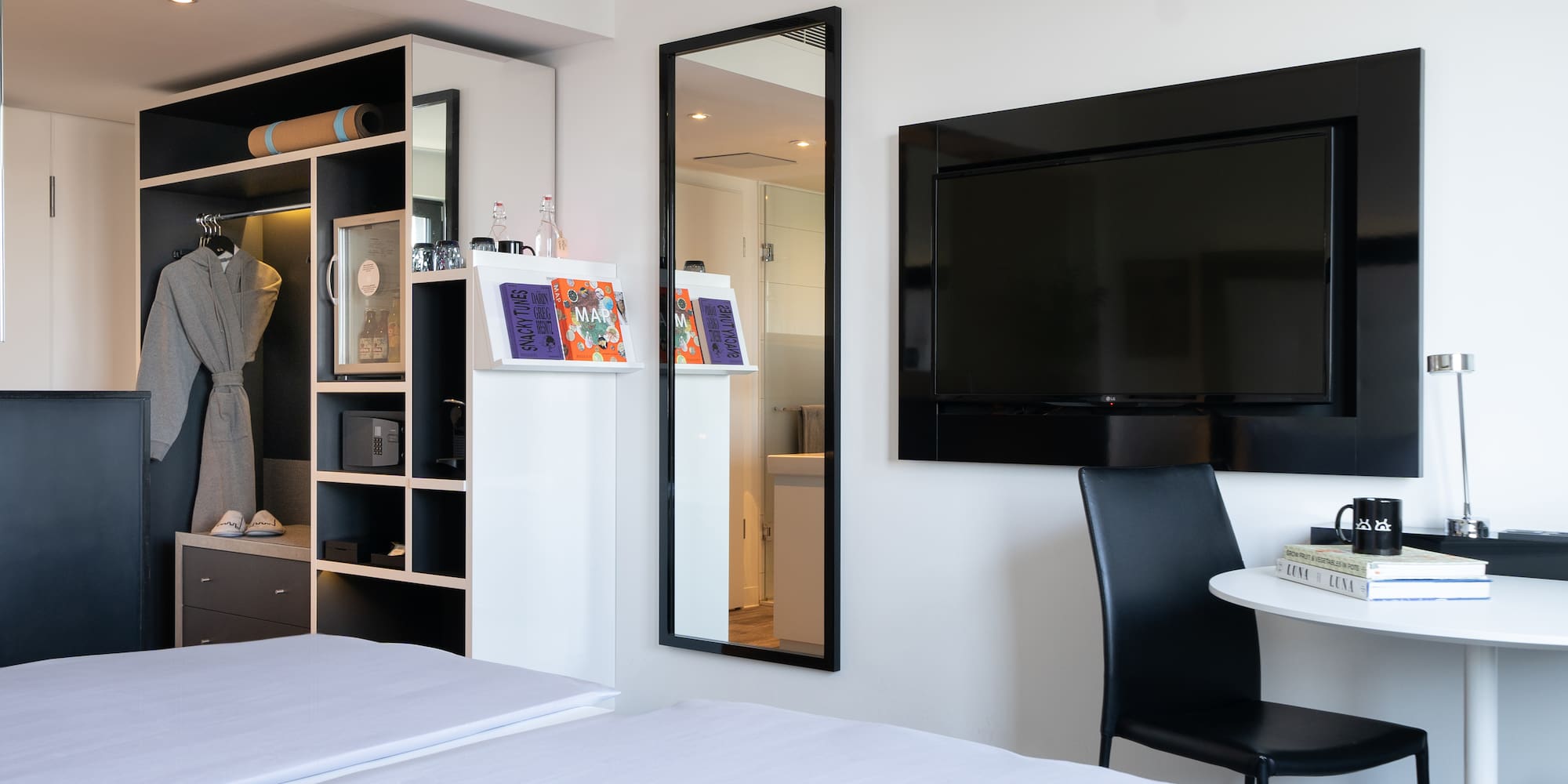 a room with a tv and a table