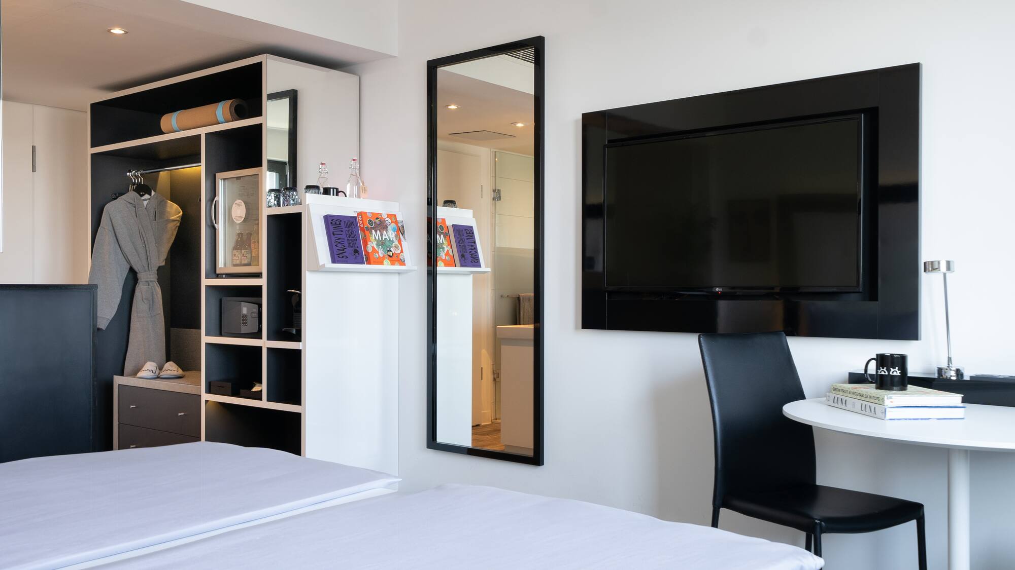 a room with a tv and a table