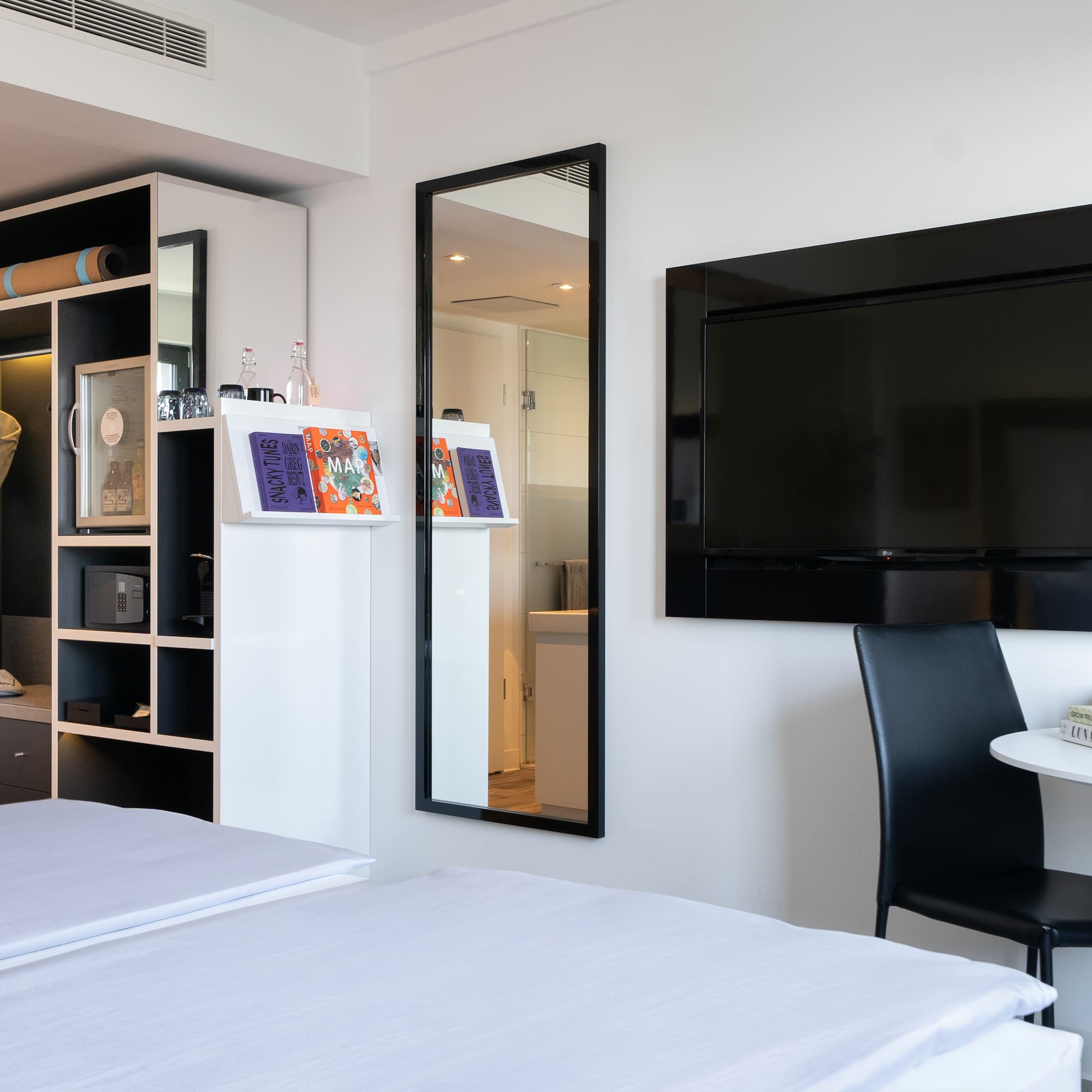 a room with a tv and a table