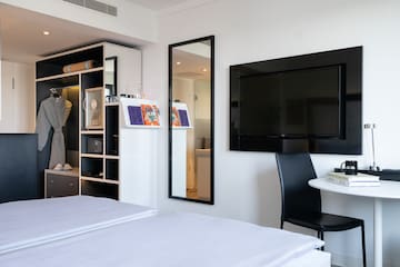 a room with a tv and a table