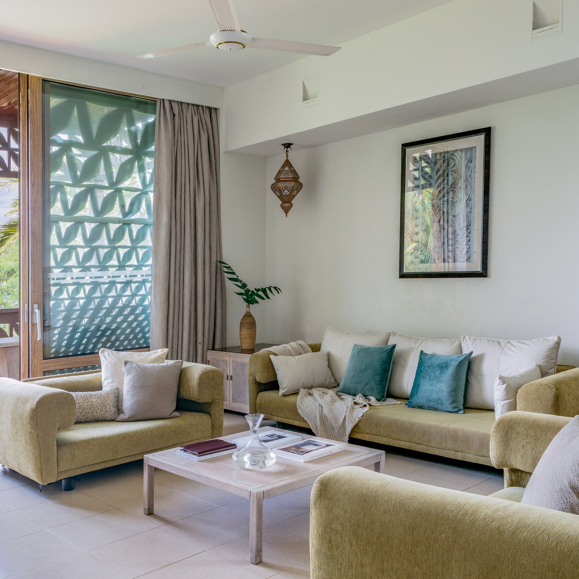 a living room with couches and a coffee table