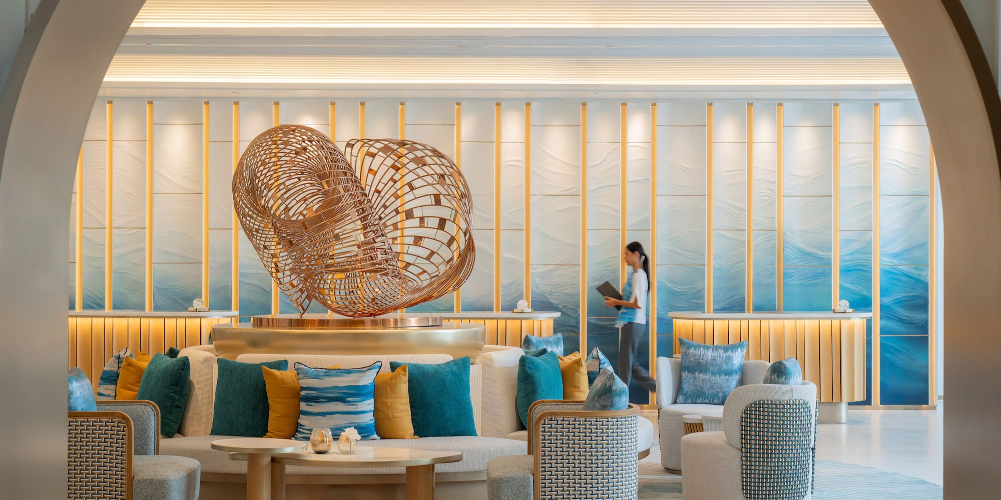 a woman standing in a lobby