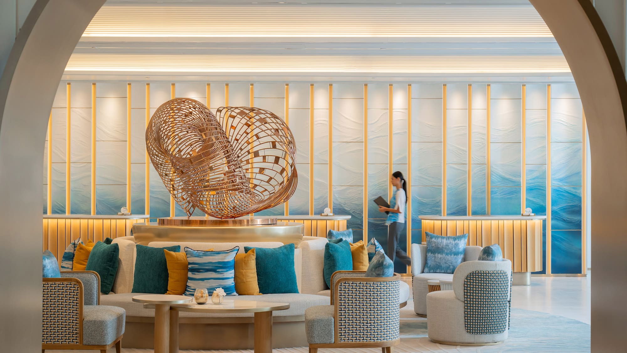 a woman standing in a lobby