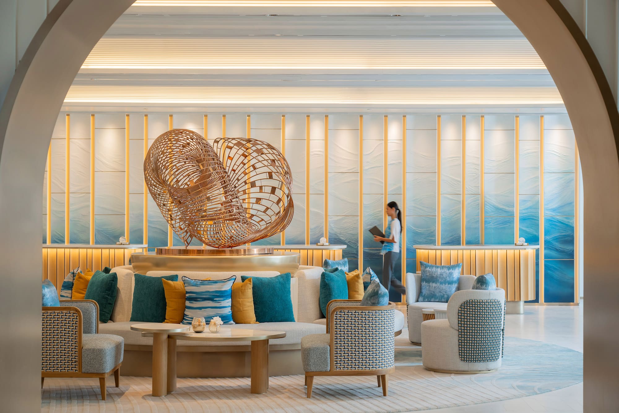 a woman standing in a lobby