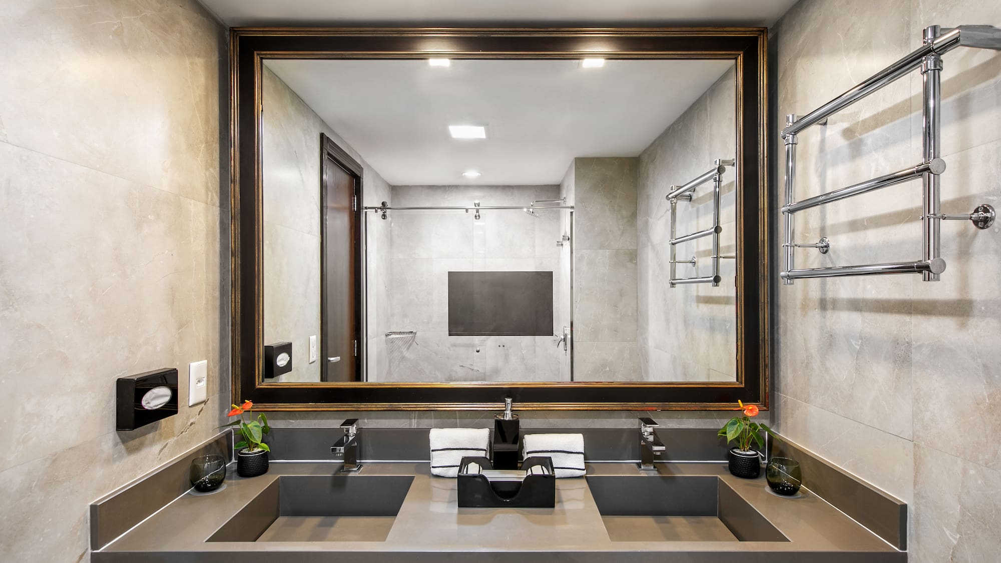 a bathroom with a mirror and sinks