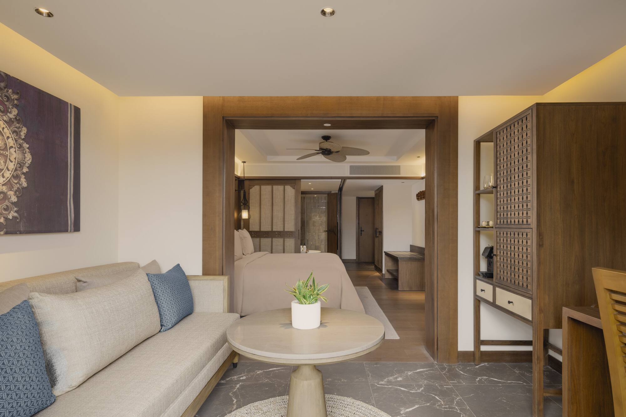 a room with a couch and a bed