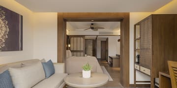 a room with a couch and a bed