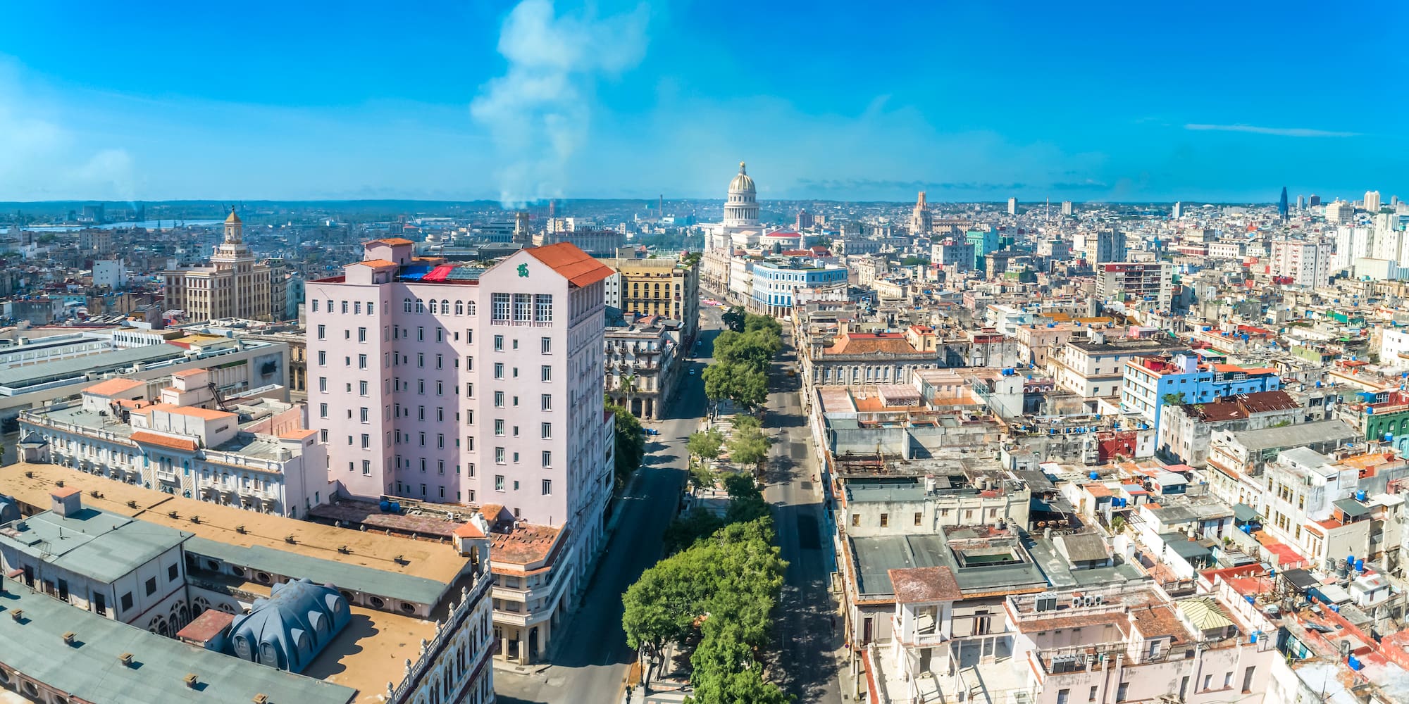 a city with many buildings and trees