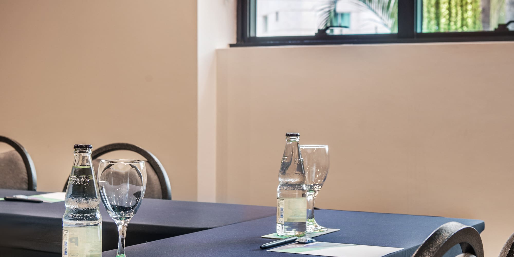 a table with glasses and bottles on it