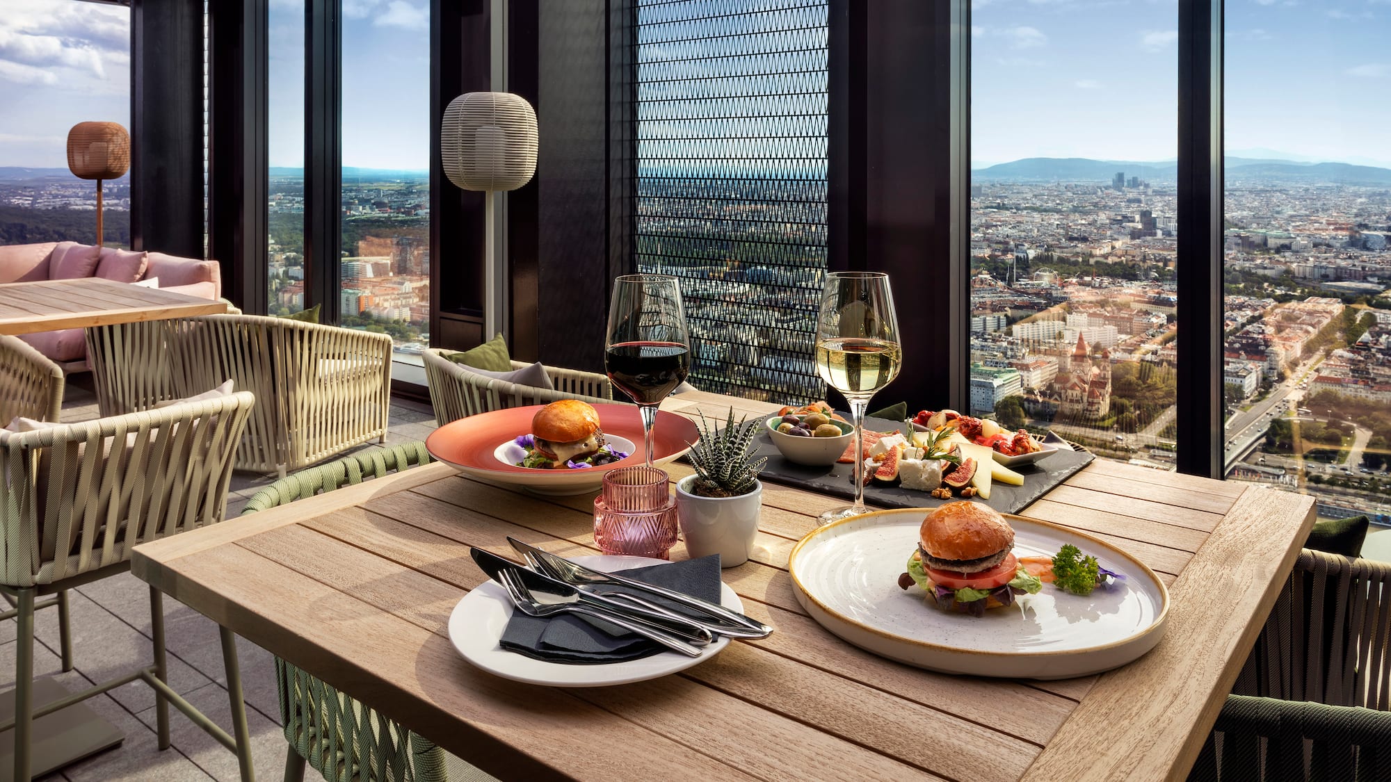 a table with food and wine glasses on it
