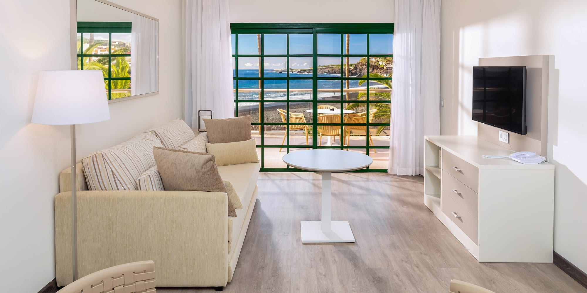 a room with a television and a table