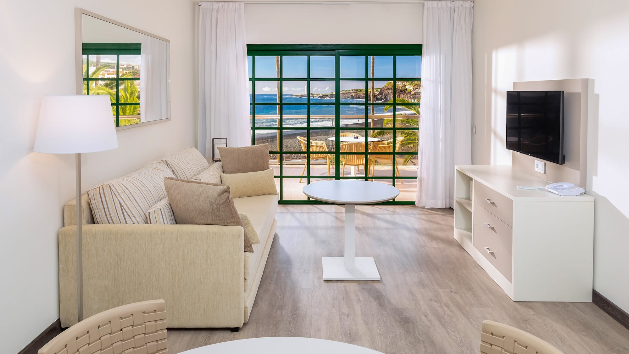 a room with a television and a table