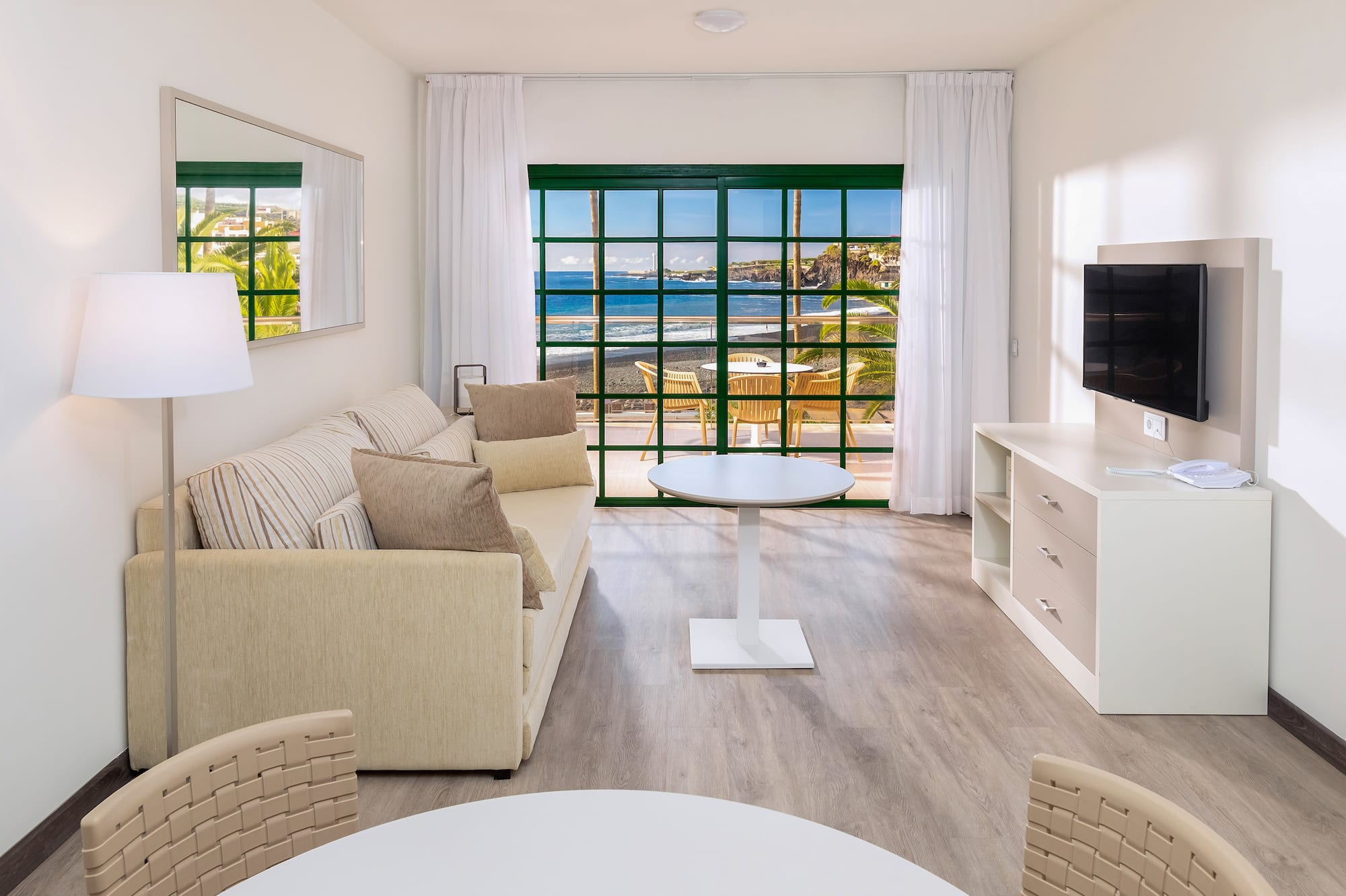 a room with a television and a table