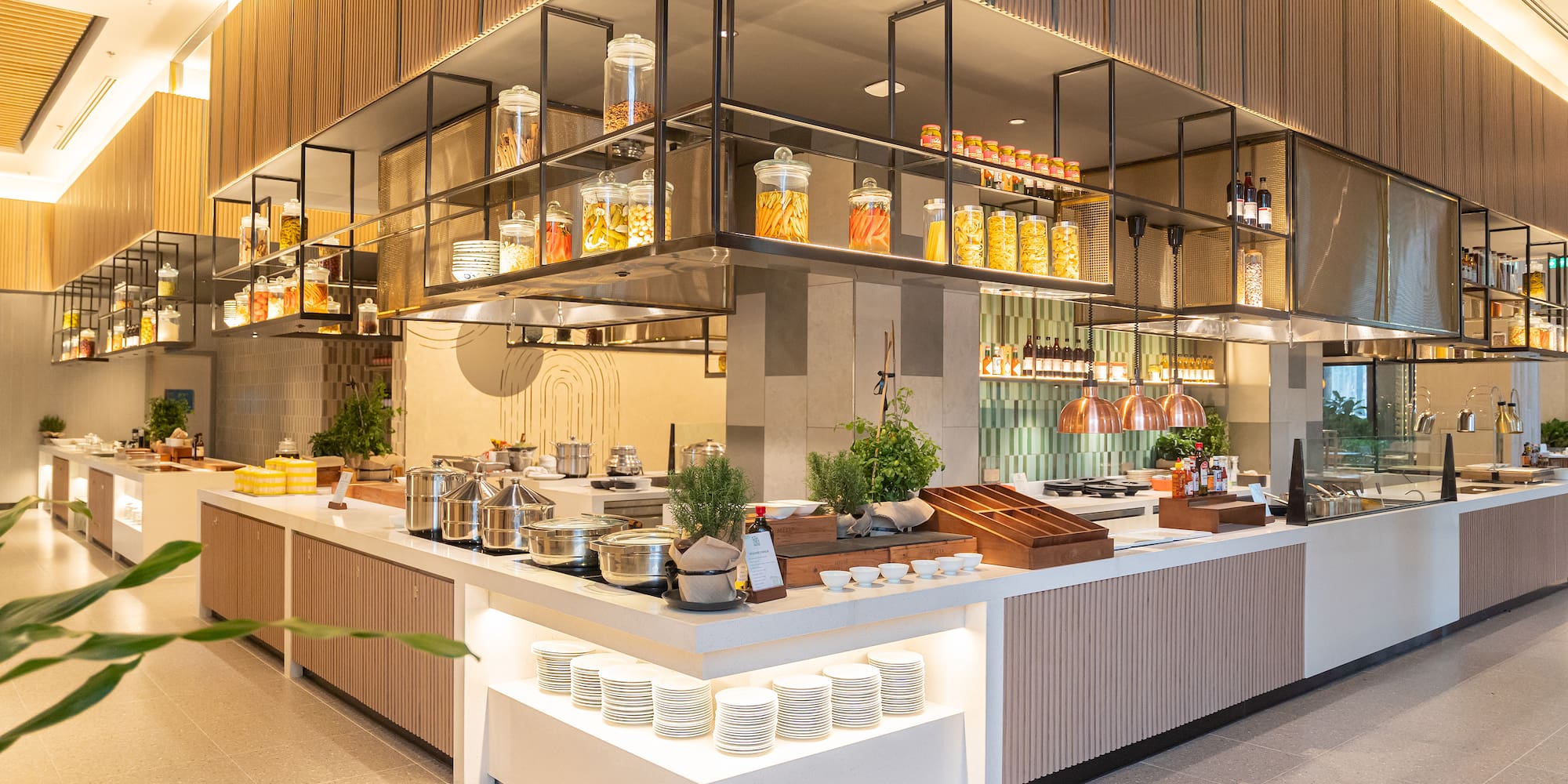 a kitchen with a large counter and shelves