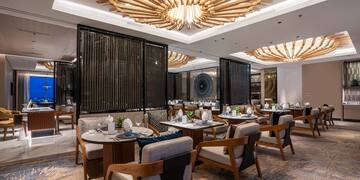 a room with tables and chairs